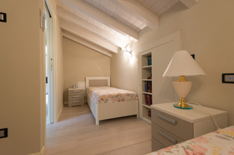 Small furnished bedroom of the Picasso flat